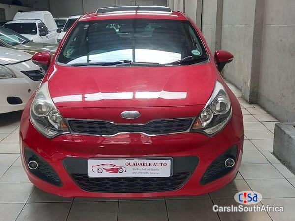 Pictures of Kia Rio 1.4 Automatic 2013