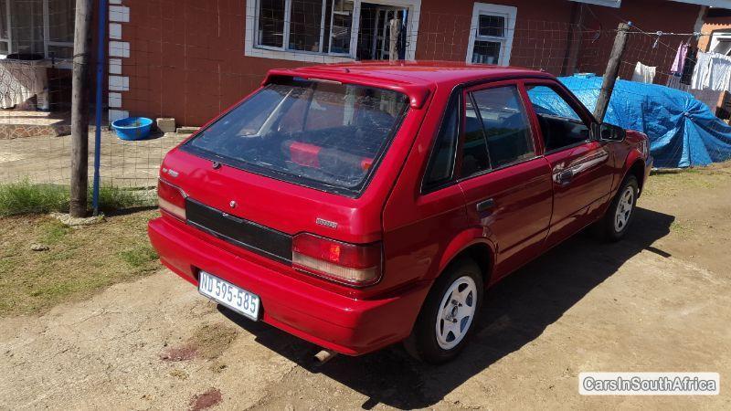 Pictures of Mazda 323 1999